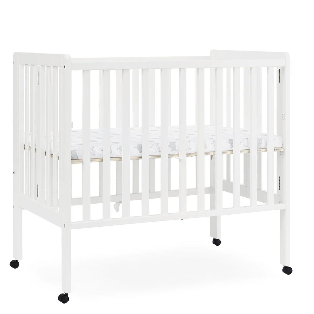 2026 NewDelta Children Lee Portable Folding Mini Crib with 1.5-Inch Mattress - Greenguard Gold Certified, Bianca White