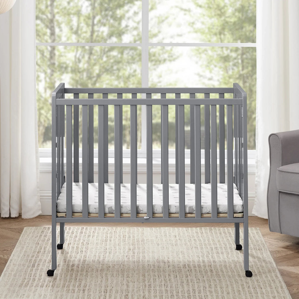 2026 NewDelta Children Lee Portable Folding Mini Crib with 1.5-Inch Mattress - Greenguard Gold Certified, Bianca White