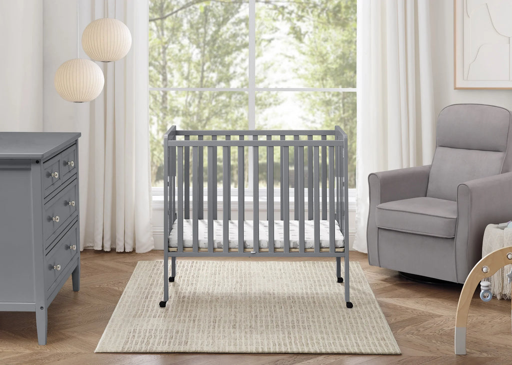 2026 NewDelta Children Lee Portable Folding Mini Crib with 1.5-Inch Mattress - Greenguard Gold Certified, Bianca White