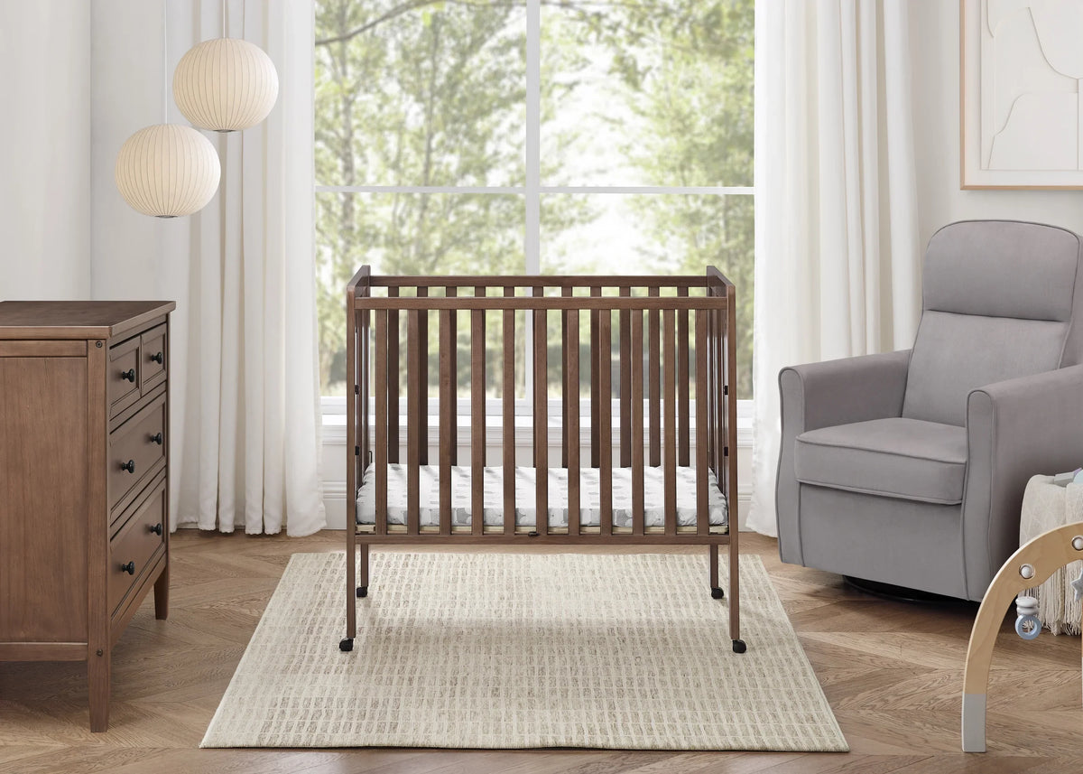 2026 NewDelta Children Lee Portable Folding Mini Crib with 1.5-Inch Mattress - Greenguard Gold Certified, Bianca White